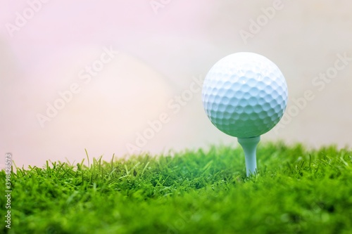 Golf ball is on green grass