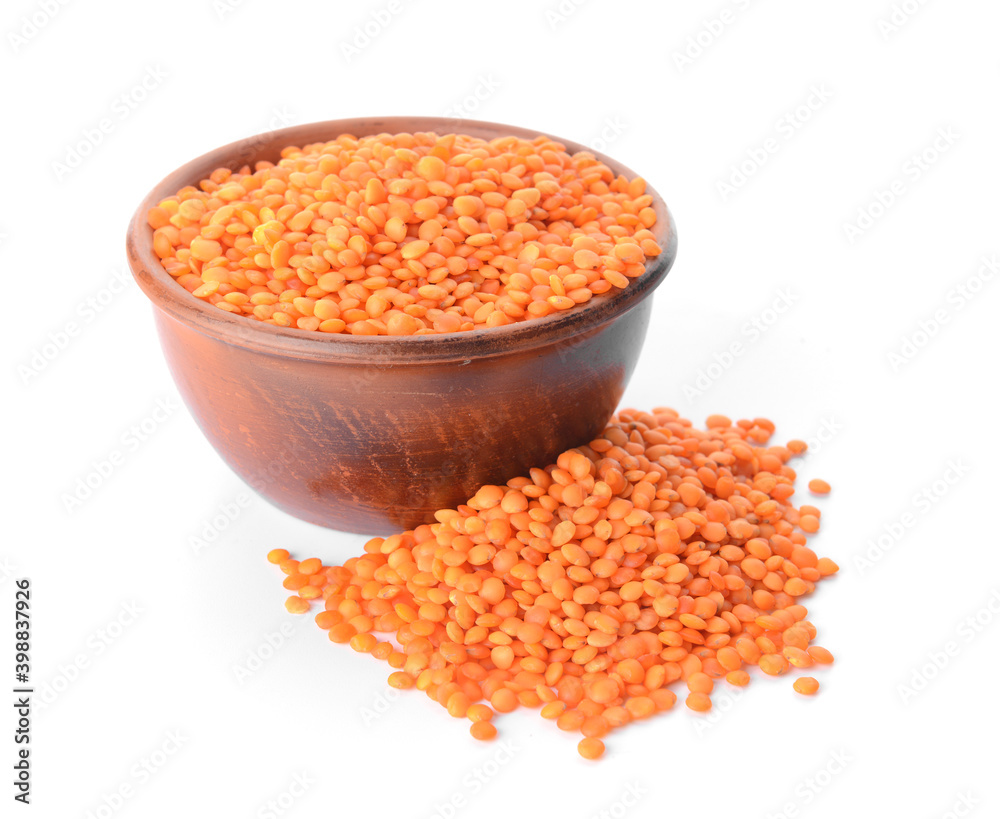 Bowl of red lentils on white background Bowl of red lentils on white background