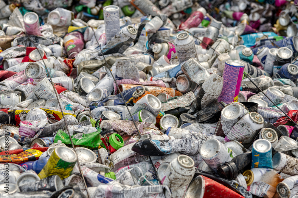 Pressed aerosol cans, waste recycling Stock Photo Adobe Stock
