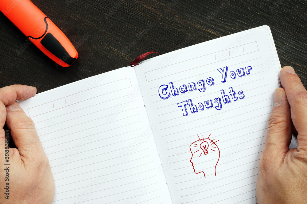 Lifestyle concept about Change Your Thoughts with sign on the page. Lifestyle concept about Change Your Thoughts with sign on the page.
