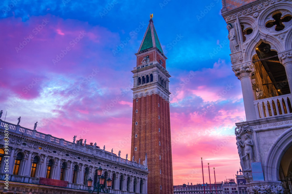 San Marco Campanile tower at beautiful sunset in Venice, Italy 