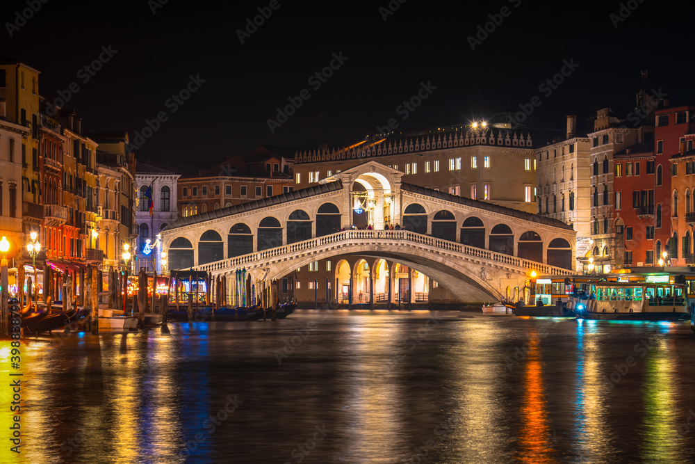 Rialto bridge at night in Venice, Italy