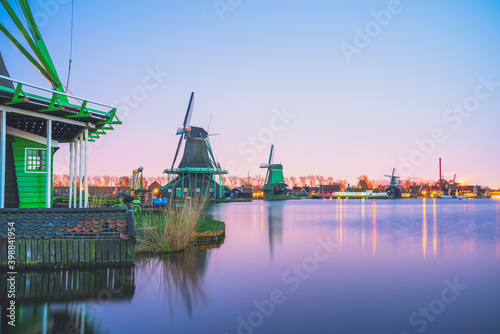 Old Dutch windmill at sunset in Zaanse Schans