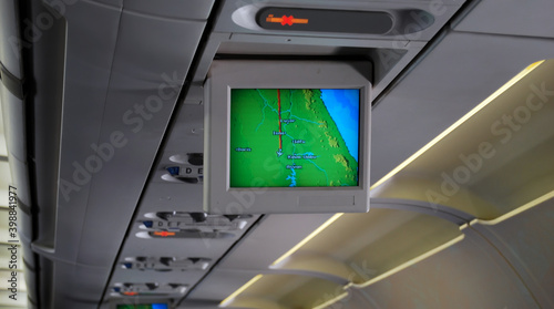 Fototapeta Naklejka Na Ścianę i Meble -  Screen with airplane's on board radar displaying the course from Cairo to Abu Simbel. Egypt