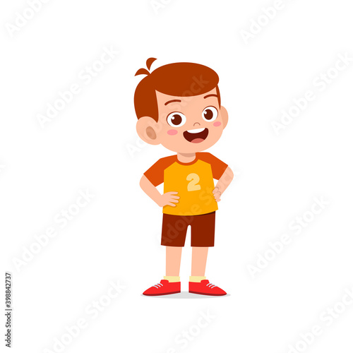 cute little kid boy stand smile with arm on hip pose expression