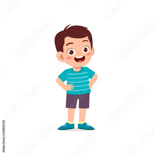 cute little kid boy stand smile with arm on hip pose expression