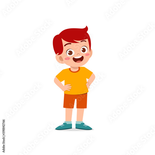 cute little kid boy stand smile with arm on hip pose expression