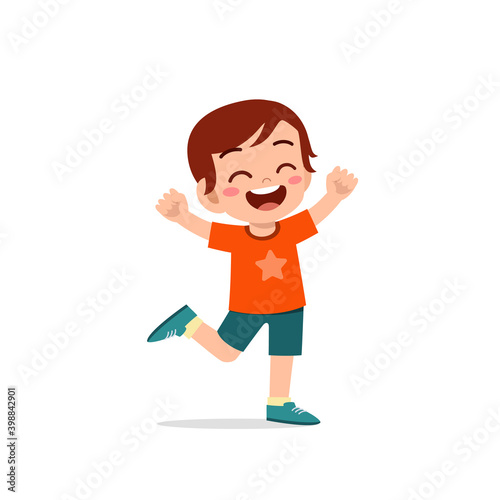cute little kid boy stand happy celebrating pose expression