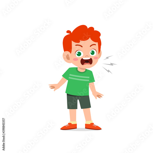 cute little kid boy stand and show angry pose expression