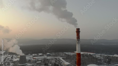 Factory pipe polluting air, environmental problems. Industrial factory pollution, smokestack exhaust gases. Climate change, ecology, atmoshere gas, ozone layer photo