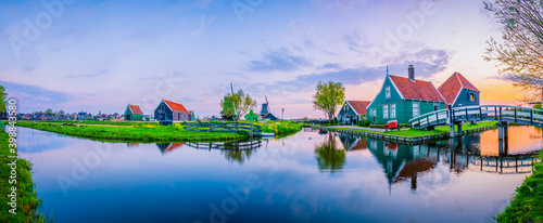 Sunrise panorama of Zaanse Schans windmill village in Netherlands