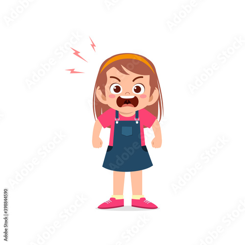 cute little kid girl stand and show angry pose expression