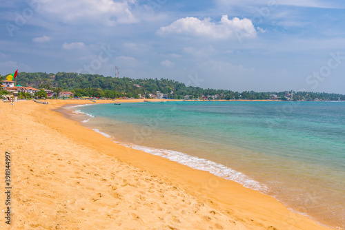 A sunny day on Unawatuna beach on Sri Lanka island