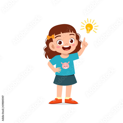 cute little kid girl show idea pose expression with light bulb sign