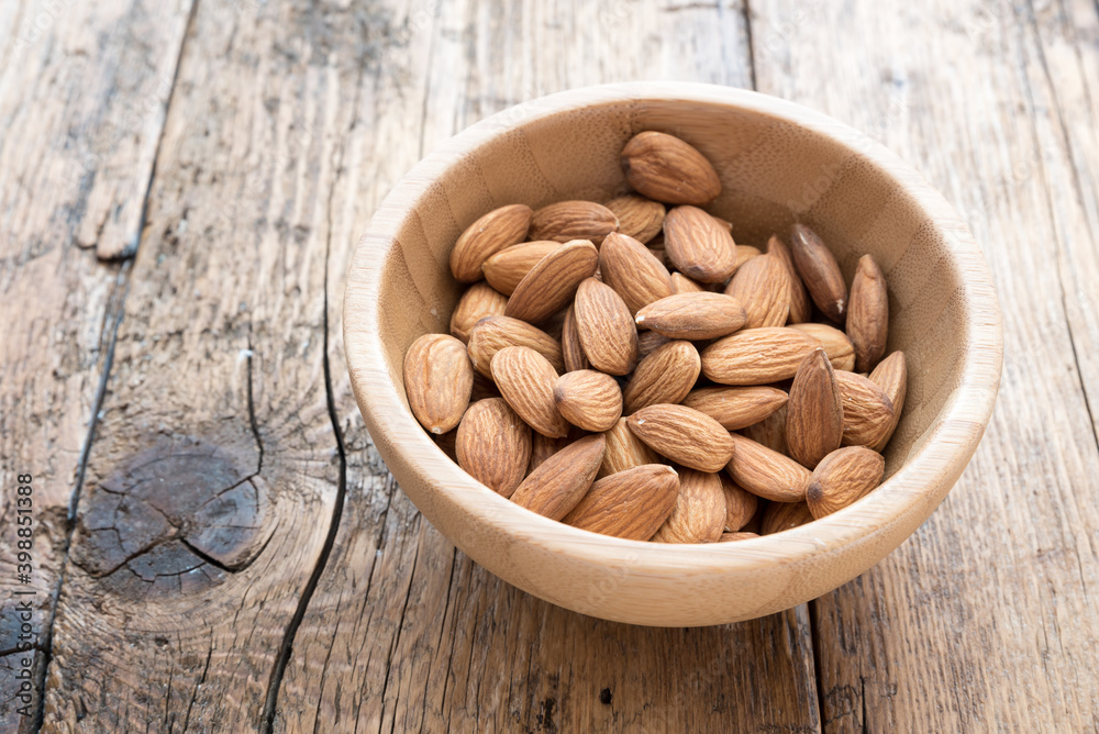 Almonds on the wooden table Almonds on the wooden table
