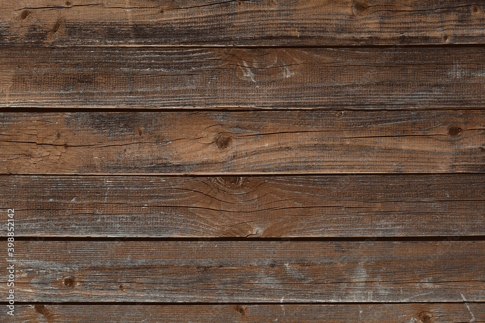 Old barn boards. Wooden background, texture with cracks Old barn boards. Wooden background, texture with cracks