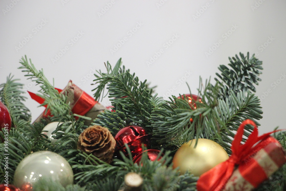 Christmas balls, baubles, decorations and present packed on the branches of fir. New year card Christmas balls, baubles, decorations and present packed on the branches of fir. New year card