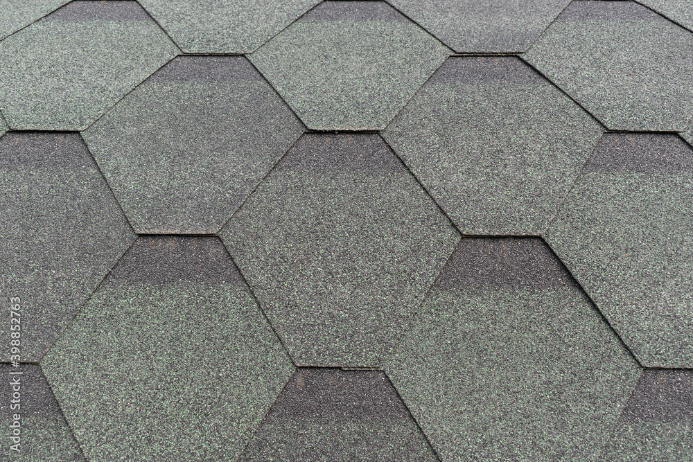 Flexible roofing material. Hexagonal shapes. Color - green, gray. Roof surface concept. Flexible roofing material. Hexagonal shapes. Color - green, gray. Roof surface concept.