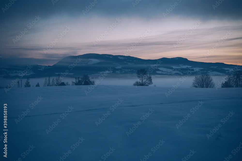 winter evening on the countryside