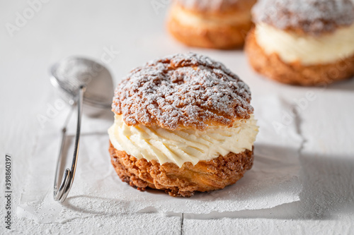 Bild auf Leinwand Homemade and tasty cream puffs made of sugar and cream