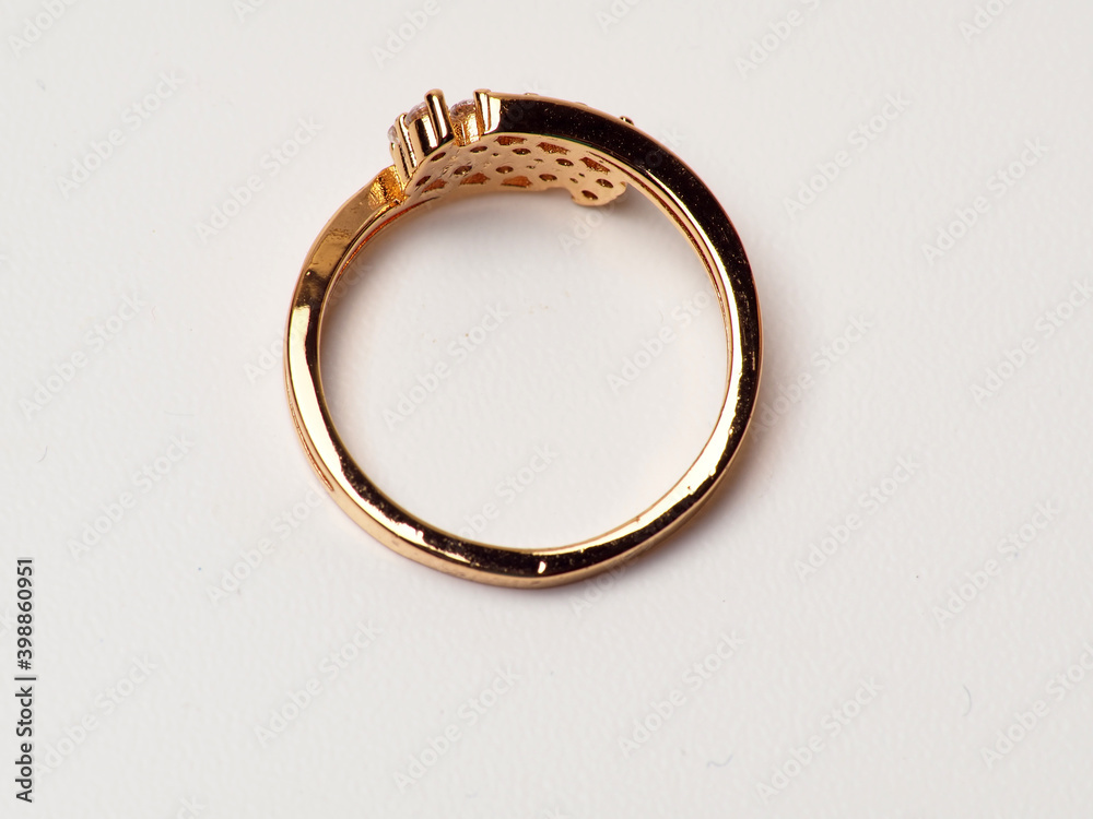 Close up shoot of gold ring with beautiful diamond, isolated on white Close up shoot of gold ring with beautiful diamond, isolated on white
