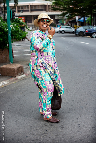 businesswoman walking on the street © vystekimages