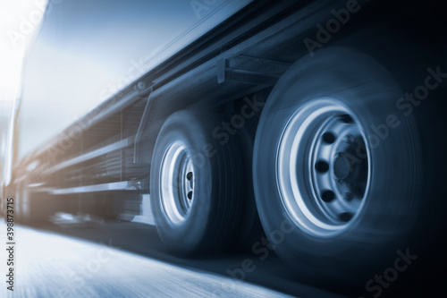 Speed blur motion of semi trailer truck driving on road. trucks loistics. Cargo freight truck transportation. © Siwakorn1933
