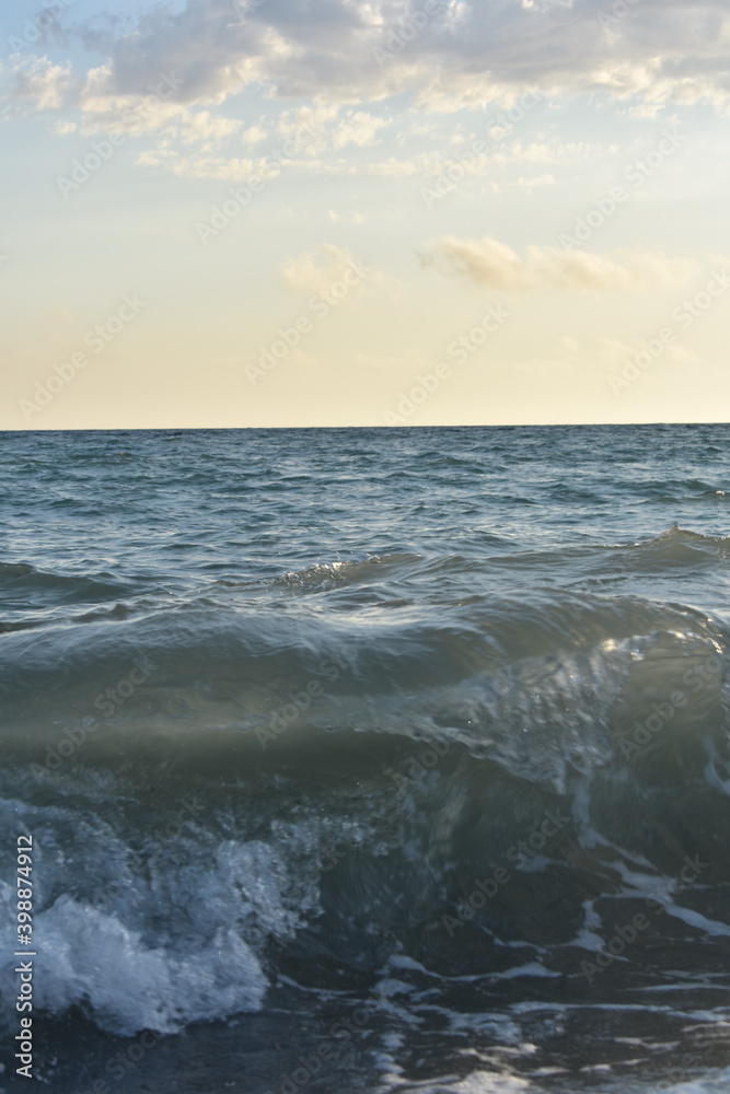 waves on the sea and yellow sky waves on the sea and yellow sky