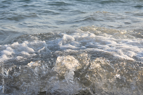 waves foam on the sea photo