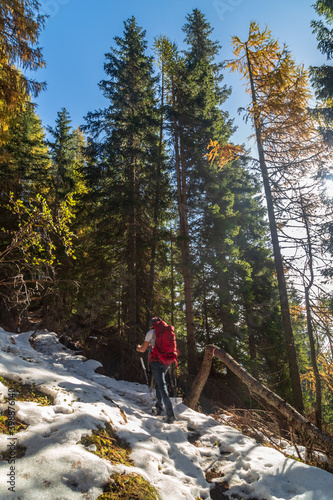 Trekking day in a snowy autumn in the Dolomiti Friulane, Friuli-Venezia Giulia