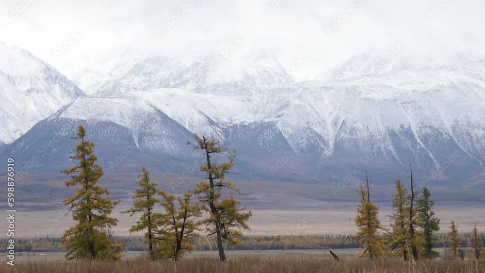 Panoramic view of majestic mountain snow-capped ridges in Altai Republic, Russia
