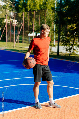 Basketball player jump shooting and playing basketball. © qunica.com