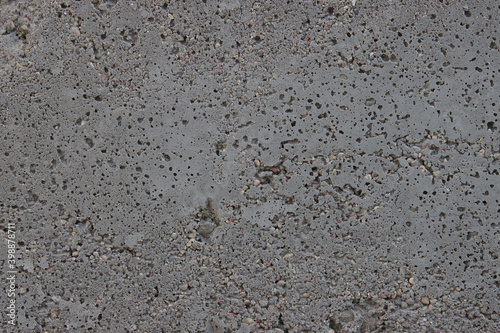 The texture of freshly poured concrete.