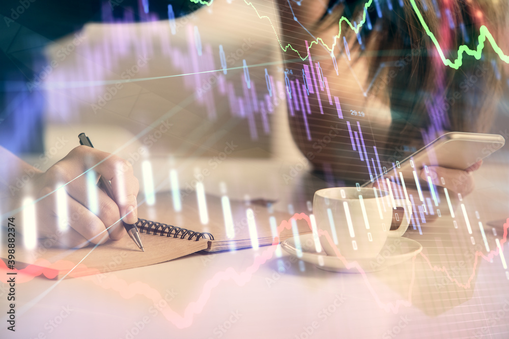 Double exposure of forex graph sketch hologram and woman holding and using a mobile device. Stock market concept. Double exposure of forex graph sketch hologram and woman holding and using a mobile device. Stock market concept.