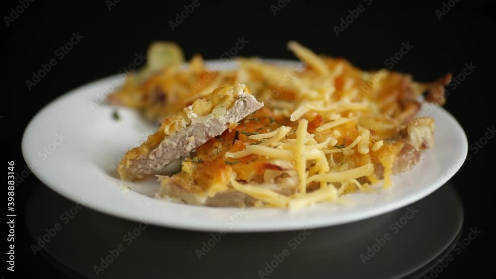 oven baked meat steak with cheese and onions