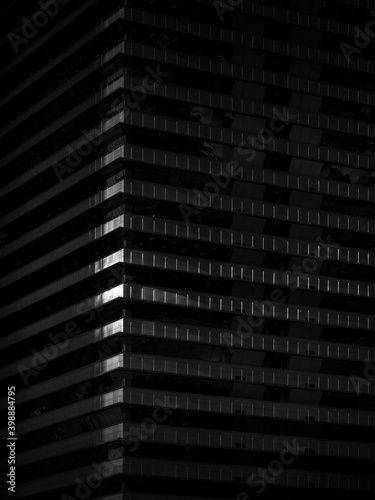 Black and white architecture detail with strong sunlight and shadows