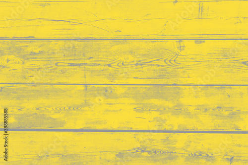 Illuminating Yellow and Ultimate Gray Wall from wooden horizontal boards close-up. Wood texture. Color of the Year 2021