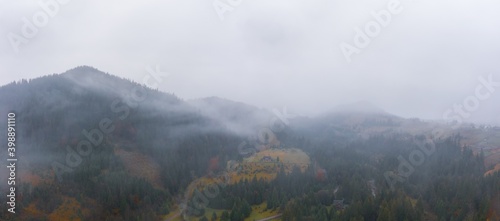 Rainy foggy weather in the Carpathian valley in beautiful Ukraine in the village of Dzembronya