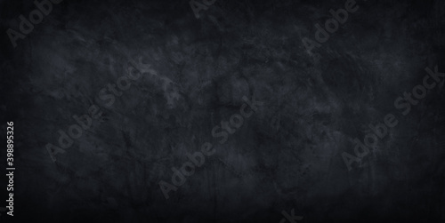 Abstract black concrete wall grunge texture background.