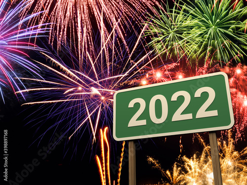 New Year 2022 Creative Design Concept with Sign Board and fire crackers - 3D Rendered Image 