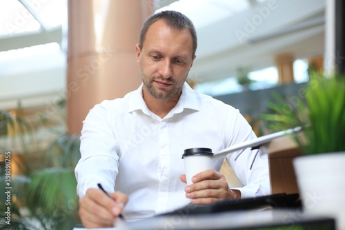 Close up business man signing contract making a deal, classic business