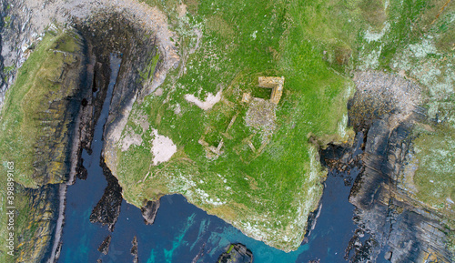 Ruined Castle near Forse and Viking Boatyard on the Caithness Coast photo