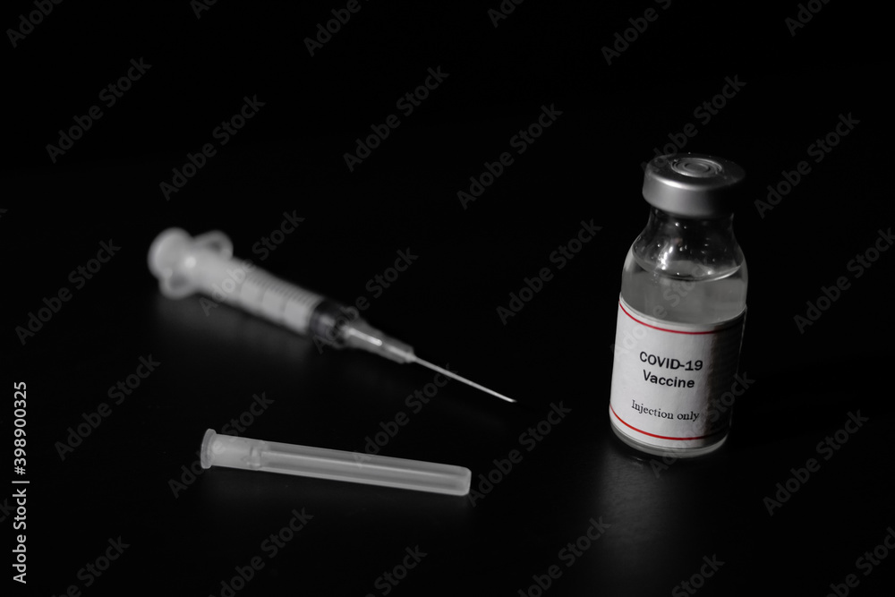 covid 19 corona virus cure vaccine injector syringe black background covid 19 corona virus cure vaccine injector syringe black background