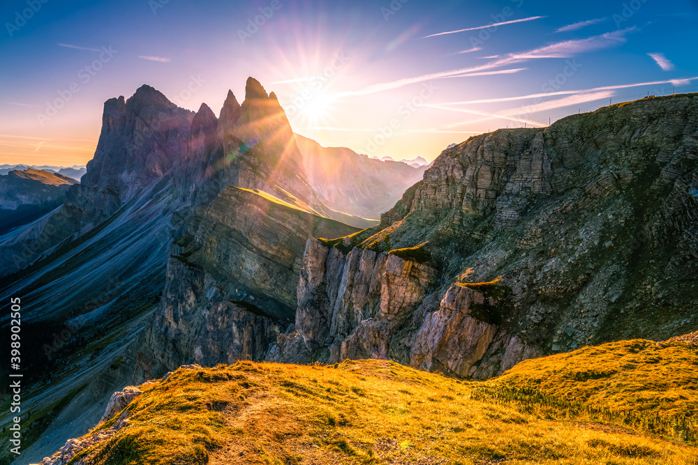 Seceda mountain peak with sunrise flare. Trentino Alto Adige, Dolomites Alps, South Tyrol, Italy, Europe