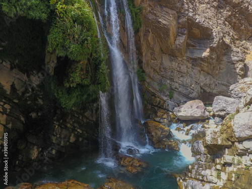 waterfall flowing in nature, cascade, cascade between rocks. Hakkari in Turkey 