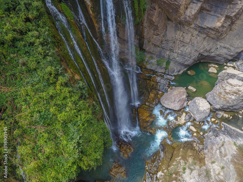 waterfall flowing in nature, cascade, cascade between rocks. Hakkari in Turkey
