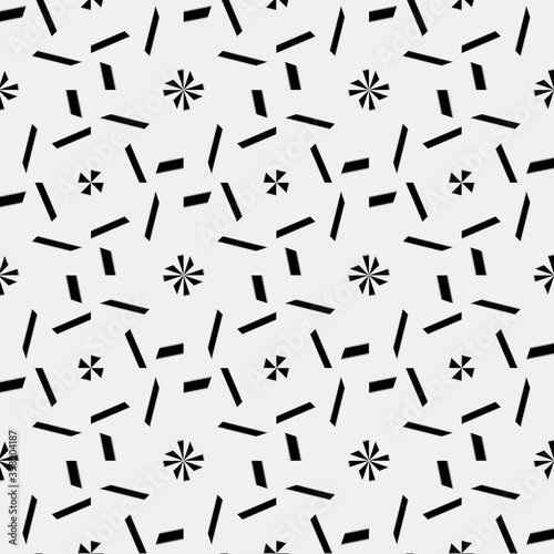 seamless background of black and white repeating patterns. 
