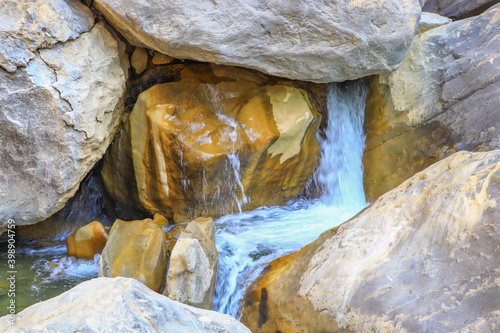 waterfall flowing in nature, cascade, cascade between rocks. Hakkari in Turkey
