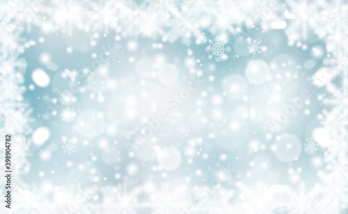 Blue abstract background. white light and snowflakes bokeh winter for Christmas new year blurred beautiful shiny lights use for card banner wallpaper backdrop and your product. © Khaohom Mali