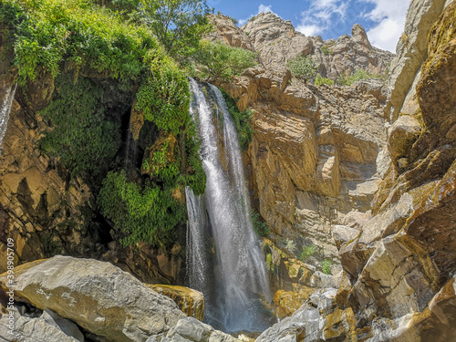 waterfall flowing in nature, cascade, cascade between rocks. Hakkari in Turkey
